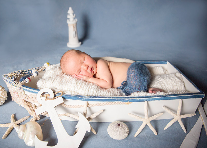 Sharon Alva Photography | Newborn Photography in boat
